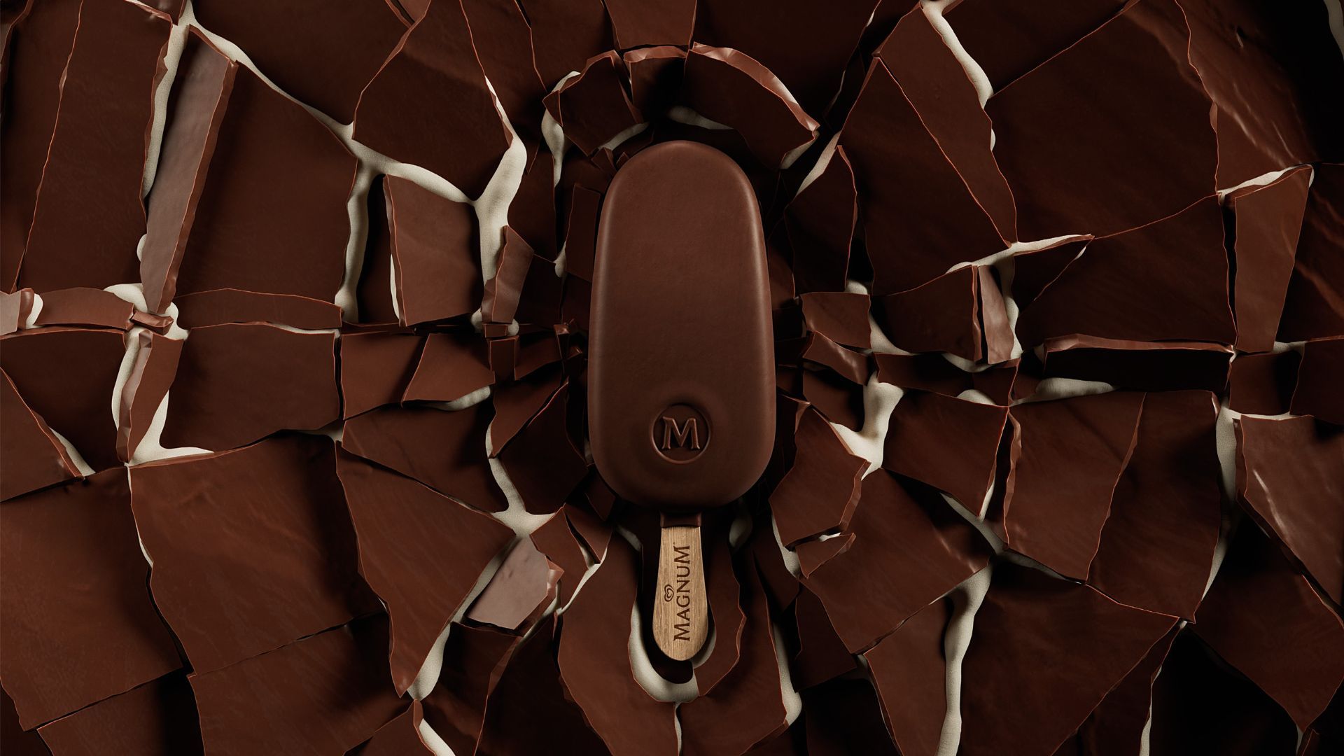 A Magnum ice cream falling into cracking chocolate