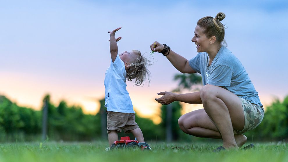 Feature image - Woman and child outside