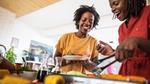 Two women cooking