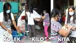 Woman collects and brings her flexible plastic waste to nearby Walastik Collection Hub.